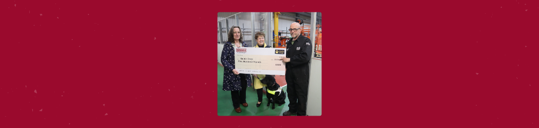 Briggs Equipment Giant Cheque Banner to Guide Dogs UK