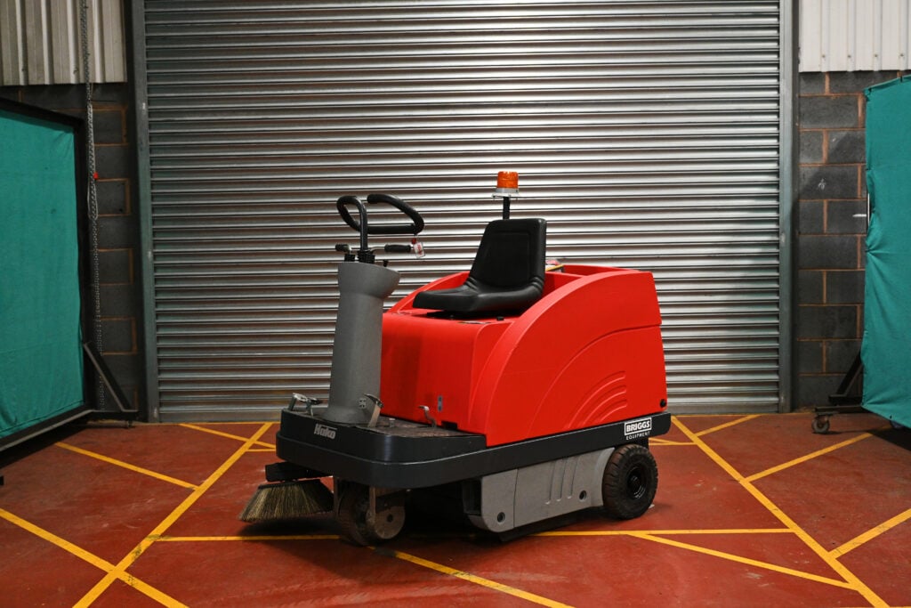 A Hako ride-on sweeper available for hire from Briggs Equipment.