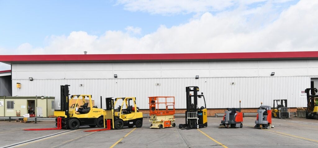 A range of materials handling equipment from Hyster, Yale, JLG and Hako parked outside Briggs Equipment Cannock