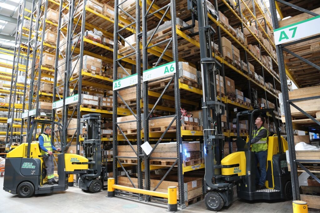 Combilift Aisle Master articulated forklifts in a warehouse environment